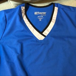 Reflective and blue scrub top